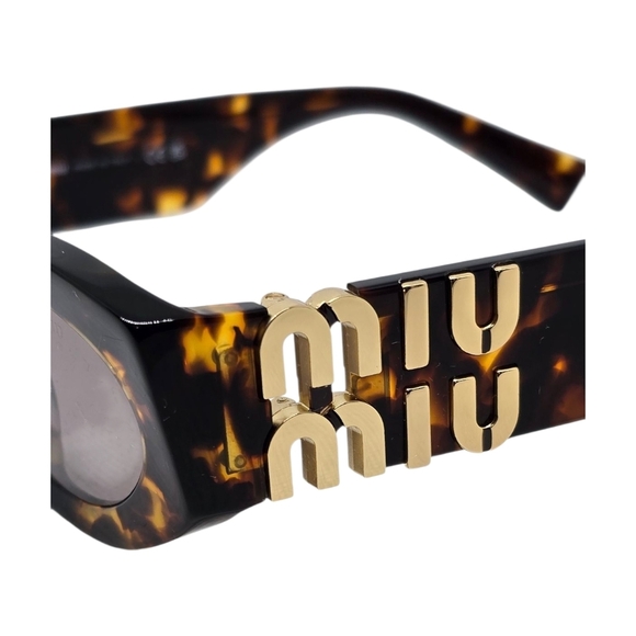 MIU MIU NEW  AND AUTHENTIC SUNGLASSES Tortoise Shell Sunglasses main image 5